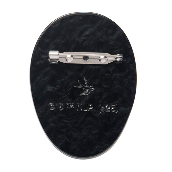 friday the 13th movie character jason voorhees' hockey mask layered acrylic resin brooch, showing back view with silver metal pin clasp