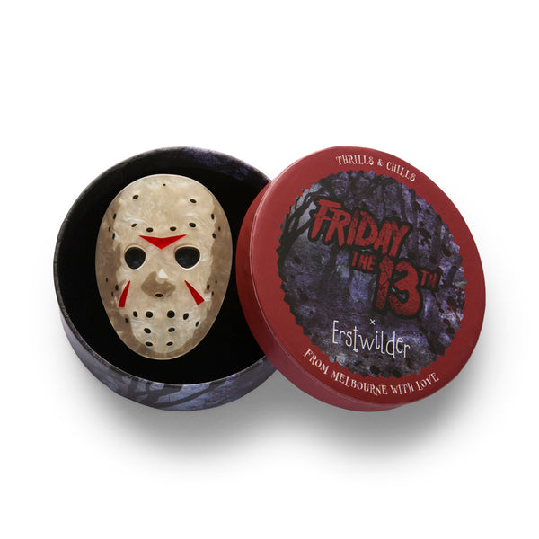 friday the 13th movie character jason voorhees' hockey mask layered acrylic resin brooch, shown in illustrated round box packaging