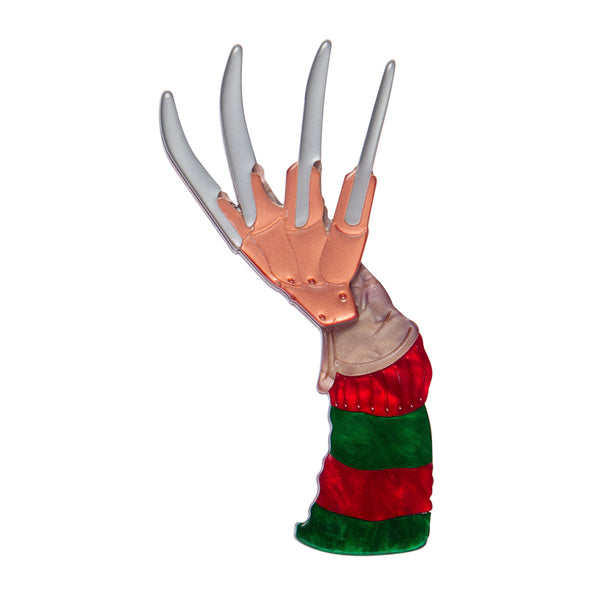 nightmare on elm street freddy krueger character's glove and arm in red and green striped sweater layered acrylic resin brooch