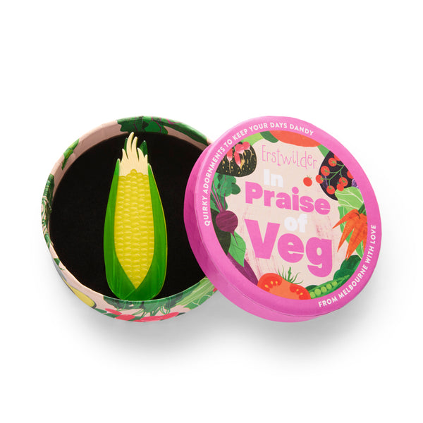 yellow and green corn on the cob layered acrylic resin brooch, shown in illustrated round box packaging