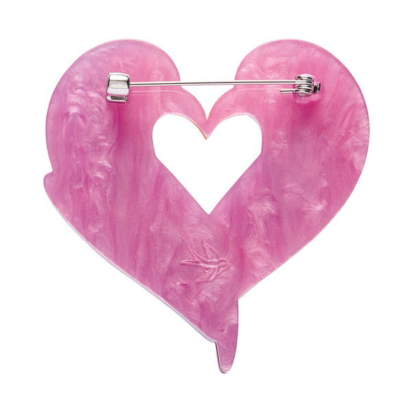 layered acrylic resin brooch depicting a pair of lovebirds in the shape of a heart, showing solid pink back with silver metal pin clasp