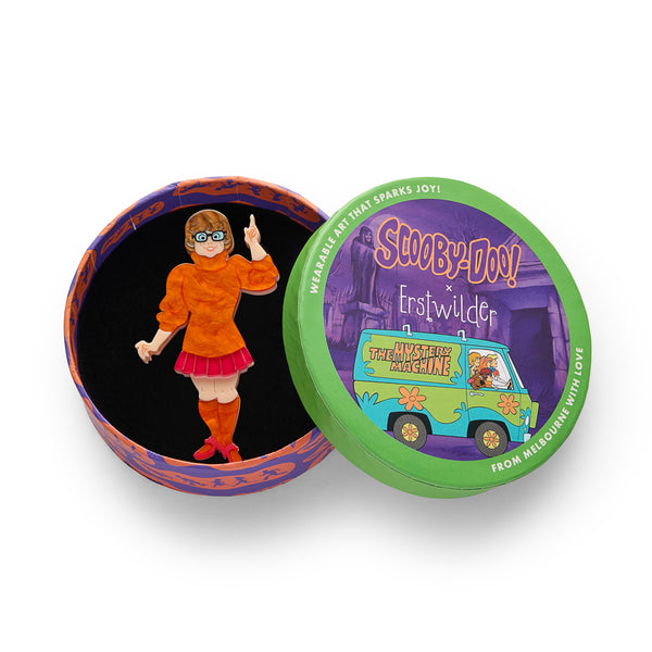 Scooby Doo cartoon character Velma acrylic resin brooch, shown in illustrated round box packaging