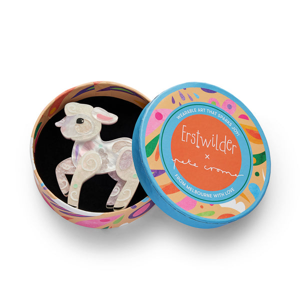 white layered acrylic resin lamb-shaped brooch, shown in illustrated round box packaging