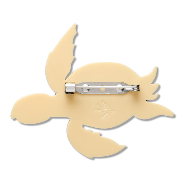 sea turtle acrylic resin brooch showing ta back layer with silver metal pin clasp fastener