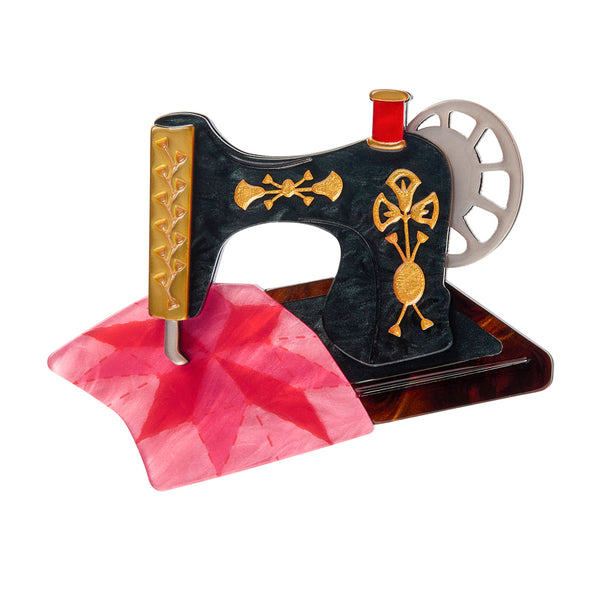 black sewing machine with pink fabric acrylic resin brooch