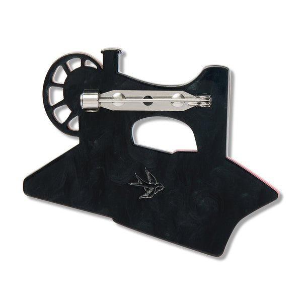 black back view of sewing machine shaped acrylic resin brooch