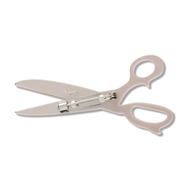 back view of metallic silver acrylic resin scissors shaped brooch