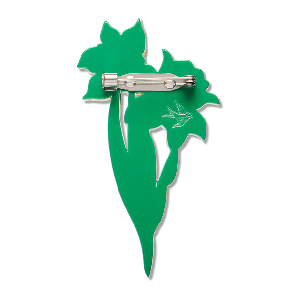 solid green back layer of a daffodils shaped acrylic resin brooch with silver metal pin clasp