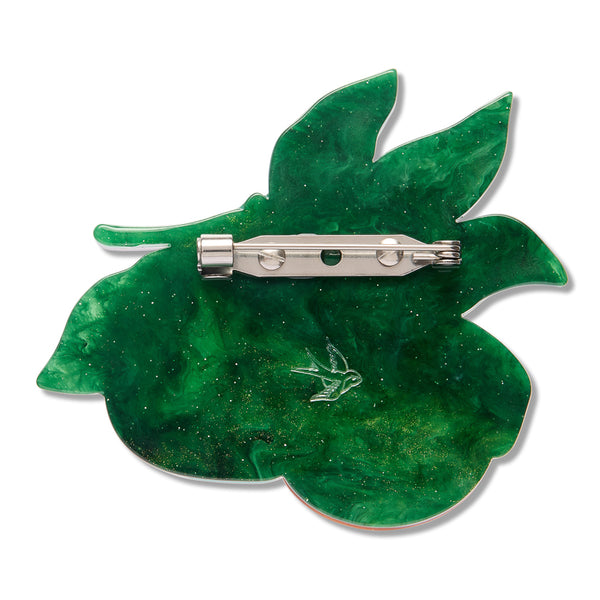 back view of marbled green resin fruit and leaf shaped brooch