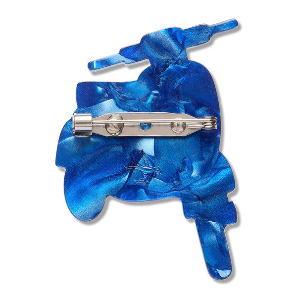 back view of marbled blue resin scooter shaped brooch