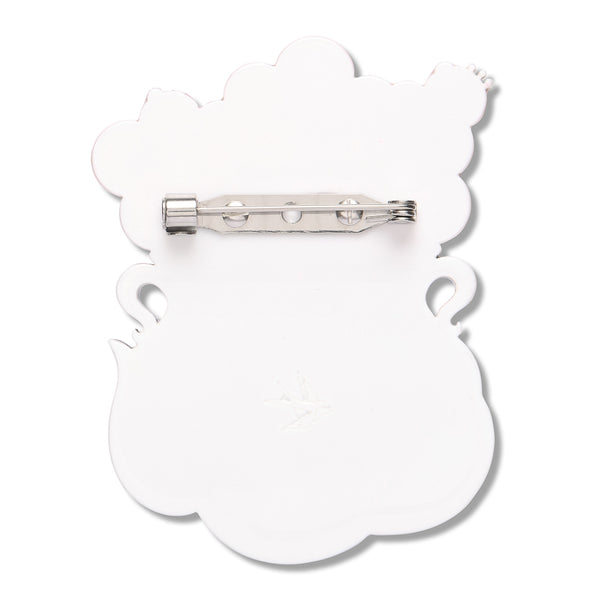 white acrylic resin back layer of cauldron shaped brooch with silver metal pin clasp fastener