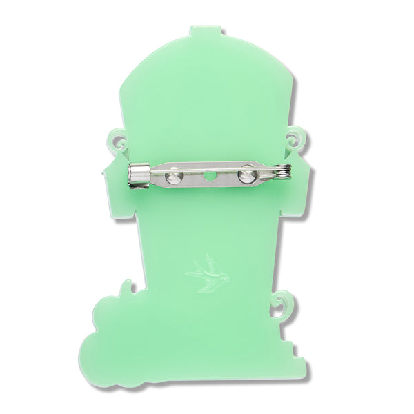 glow green resin back layer of a door and stoop-shaped brooch with silver metal pin clasp fastener