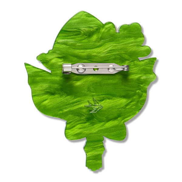 solid green back layer of layered acrylic resin floral bouquet brooch with silver metal pin clasp
