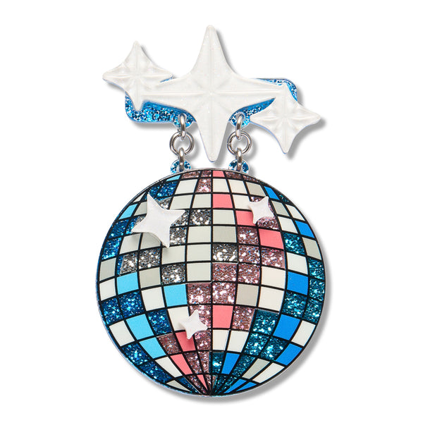 A disco ball shaped layered acrylic resin brooch in a checkered pattern of blue, pink, white, and silver glitter, hanging from two white star-shaped charms with blue glitter trim on a white background.