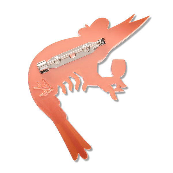 A copper-colored acrylic resin prawn-shaped brooch pin with a silver-tone pin clasp, shown against a plain white background.