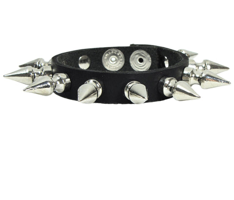 1/2" wide black leather wristband with one row of 10 long silver metal tree spikes and snap closure