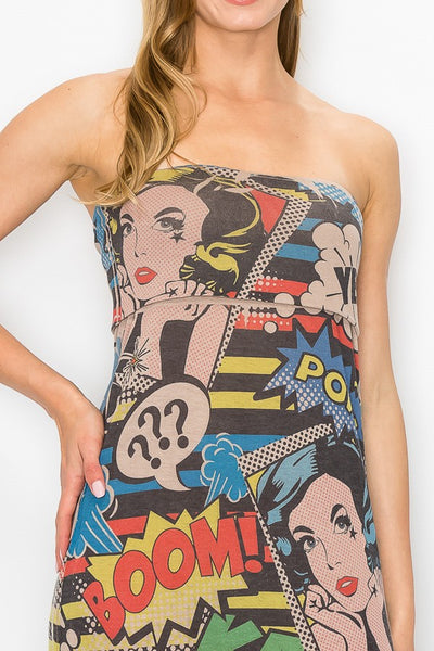 Woman wearing a strapless dress with comic book-style print on a tan background