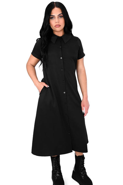 Model wearing a black rayon blend button-front slightly relaxed fit dress with a pointed collar, cuffed short sleeves, slightly a-line midi length skirt, and side seam pockets. Shown from front