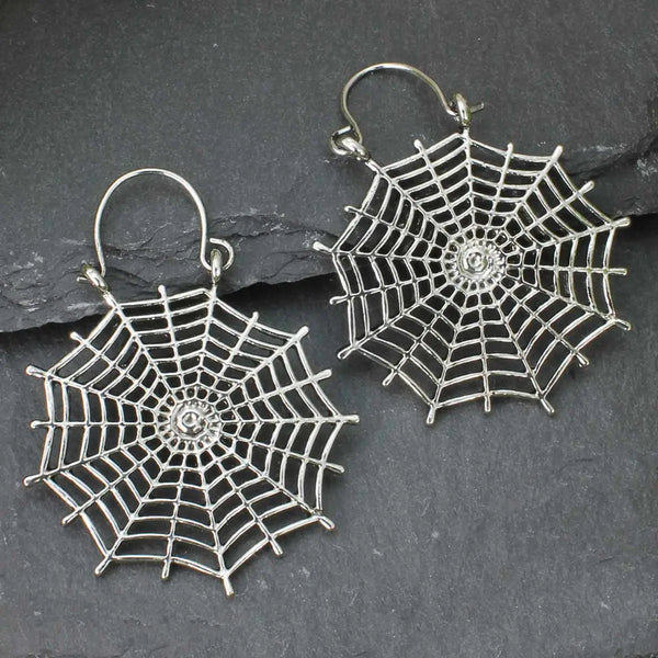 pair of intricate silver metal spiderweb shape drop hoop earrings