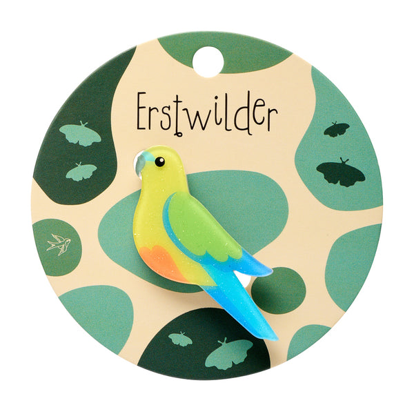 Colorful parrot-shaped acrylic resin brooch shown on illustrated backer card packaging