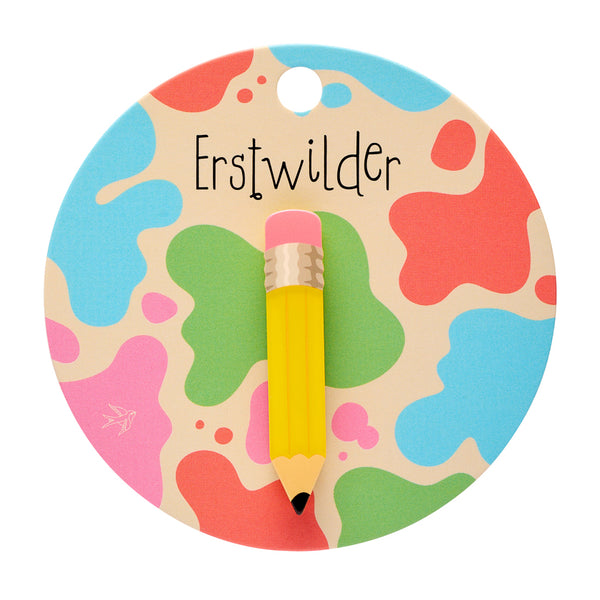yellow and pink pencil-shaped acrylic resin brooch, shown on colorful backer card packaging