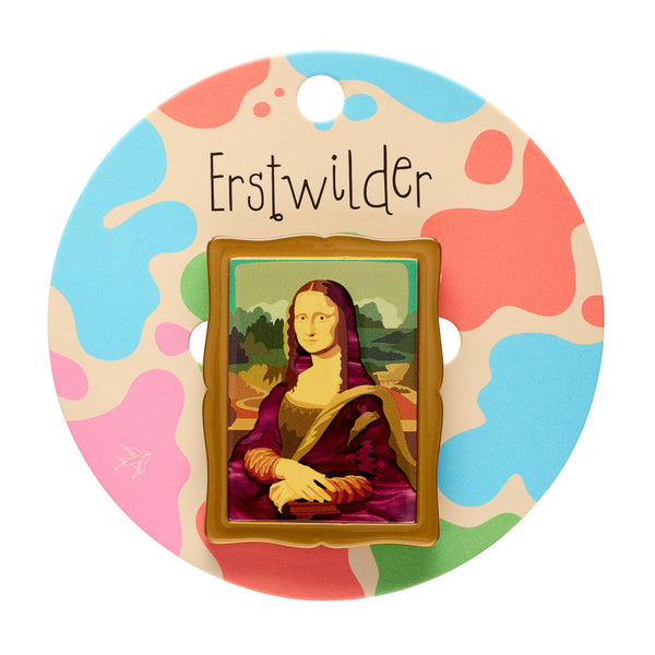 acrylic resin brooch depicting Leonardo da Vinci's painting "Mona Lisa" in a metallic gold frame, shown on colorful backer card packaging