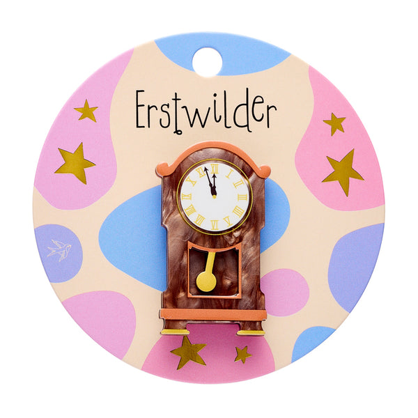 brown acrylic resin grandfather clock shaped brooch, shown on "erstwilder" branded backer card