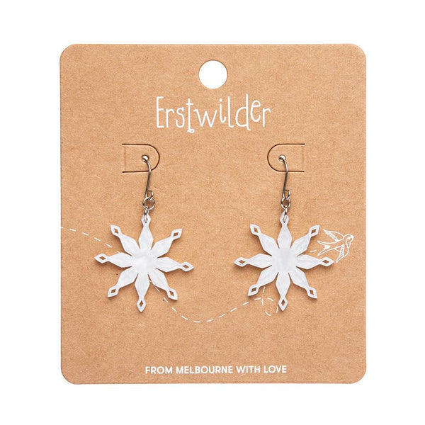 pair Essentials eight point snowflake shaped dangle earrings in bright white ripple texture 100% Acrylic resin, shown on illustrated backer card packaging