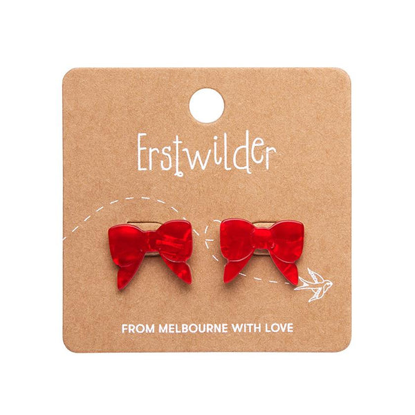 pair Essentials Collection bow shaped post earrings in bright red ripple texture 100% Acrylic resin, shown on illustrated backer card packaging