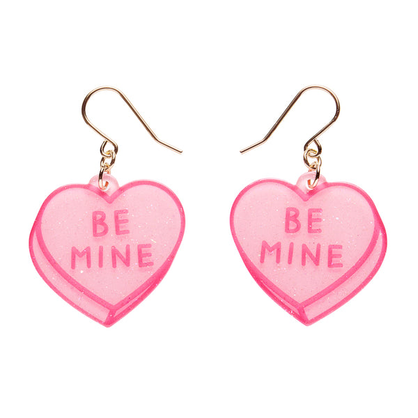 pair of "BE MINE" candy heart dangle earrings in pink glitter acrylic resin