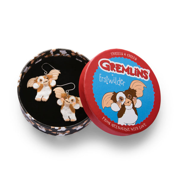 pair of Gremlins movie Gizmo character layered acrylic resin dangle earrings, shown in illustrated round box packaging