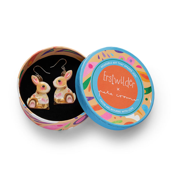 pair of multi browns layered acrylic resin rabbit-shaped earrings , shown in illustrated round box packaging