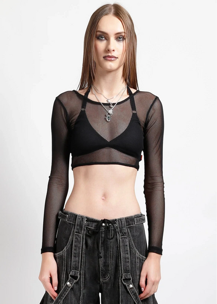 Model wearing a black sheer long-sleeve fishnet crop top and dark jeans on a white background. Shown from front