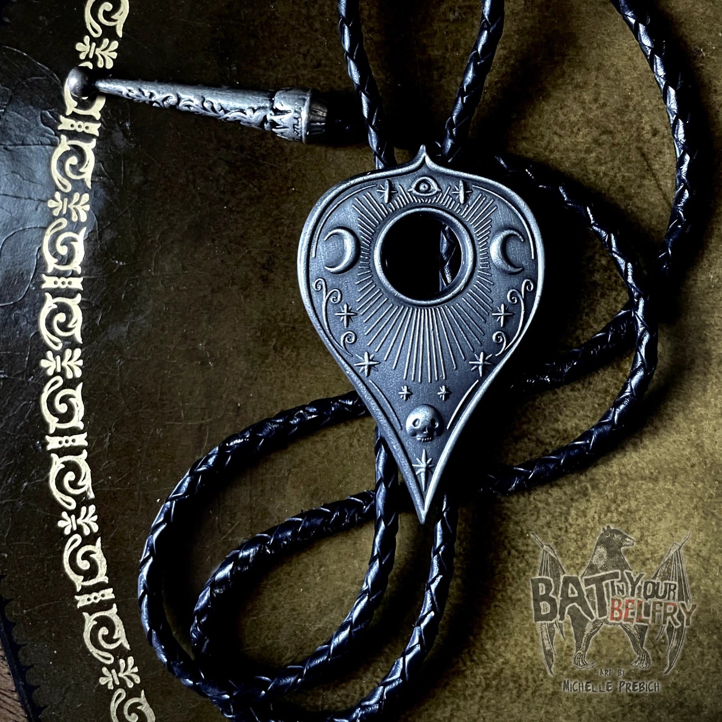 Antiqued pewter planchette charm bolo tie with braided black leather cord and antiqued pewter tips