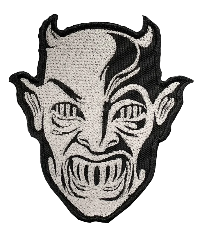 Silver and black canvas embroidered patch of metal mask from 1985 movie Demons
