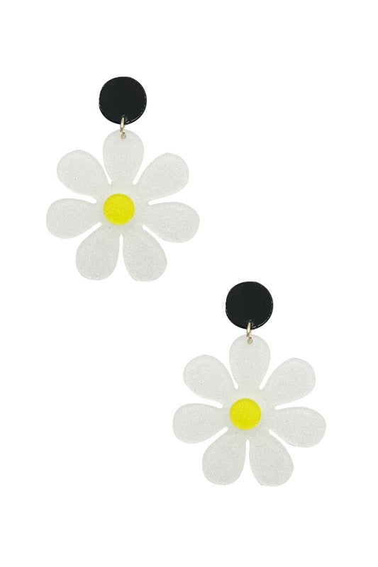 glitter white, yellow, and black acrylic daisy drop earrings
