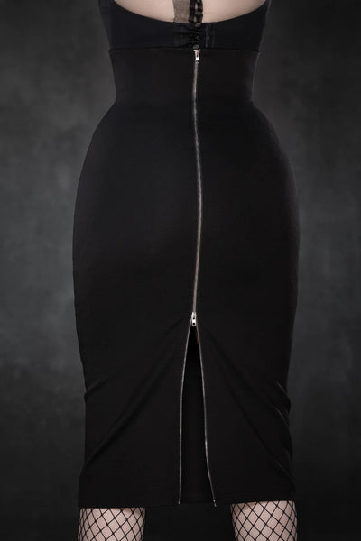 A model wearing a high-waisted black pencil skirt. The back of the skirt is shown which has a silver metal zipper running the length of the entire skirt. It has a double zipper pull