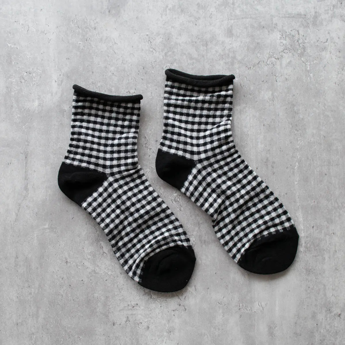 cotton knit socks in a black and white knit-in gingham pattern