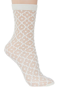Sheer socks in a classic creamy white floral diamond pattern with solid matching cuffs and toes.