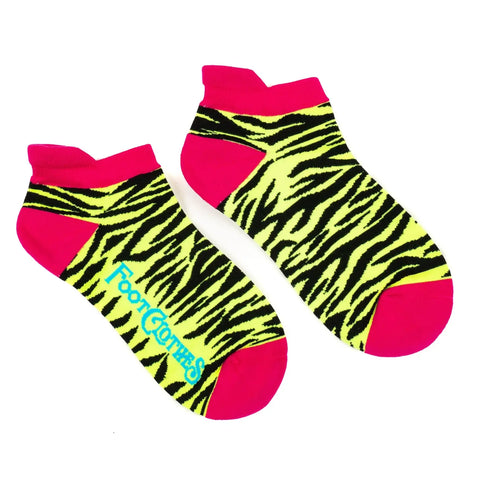 neon yellow and black zebra stripe pattern soft stretch cotton blend ankle socks with neon pink cuffs, heels, and toes. Shown on a white background