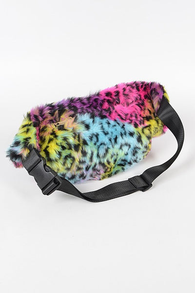 rainbow leopard print faux fur fanny pack purse with top zipper closure and muff feature, back zipper closure, inner zippered pocket, and adjustable 1 1/2” wide black strap. Shown with both outer zippered pockets open. Shown with strap in front closed