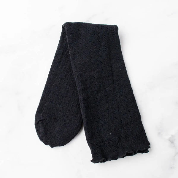 ummery cotton knit socks with rolled top band in a classic black geometric openwork design. Shown lying flat