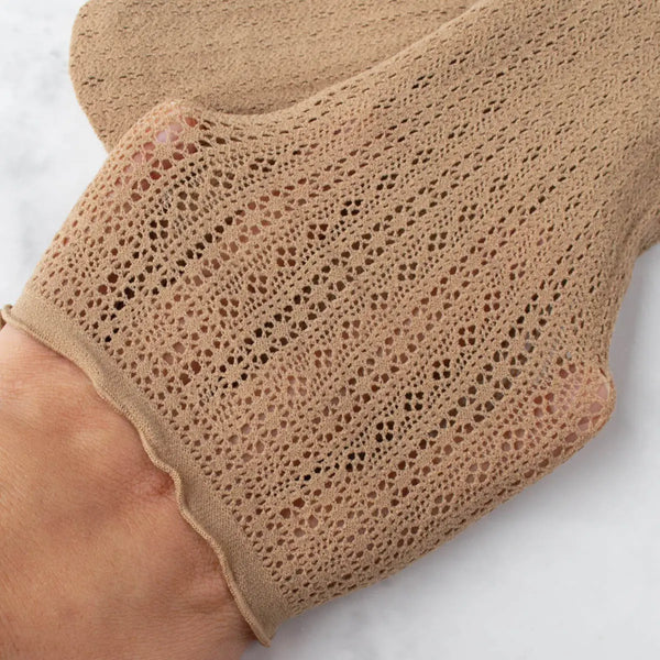 cotton knit socks with rolled top band in a light brown geometric openwork design. Shown held taut to display openwork design