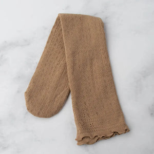 cotton knit socks with rolled top band in a light brown geometric openwork design. Shown lying flat