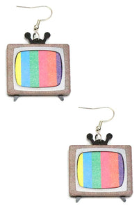 Wooden dangle earrings in the shape of a pair of cartoony retro televisions with multicolored test patterns on the screen
