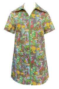 A short sleeved mini dress with an exaggerated pointed collar and green plastic zipper down the front. It has a psychedelic pattern with motifs including star spotted mushrooms, daffodils, paisley, snails, and pinwheels- in shades of yellow, red, green, and black. Shown from front zipped without sash belt