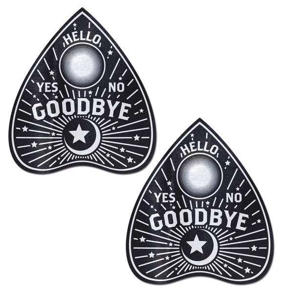 A pair of black and white Ouija board planchette shaped pasties