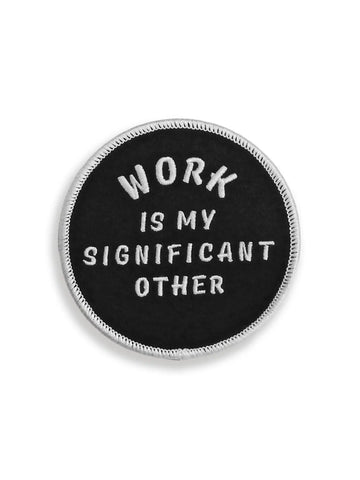 Round embroidered patch with “Work is my significant other” written in white on a black background 