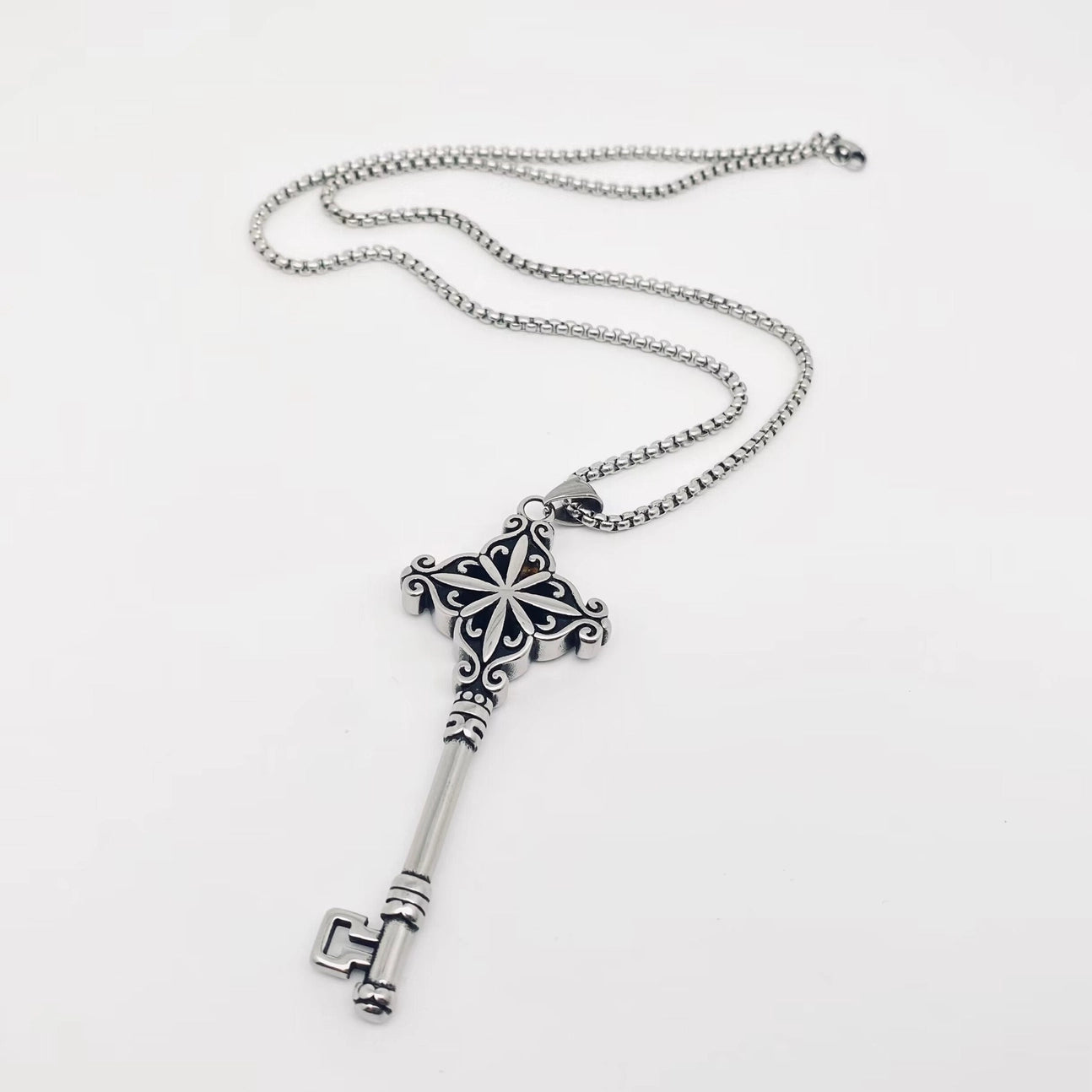 Ornate stainless steel antique style key pendant on 23” stainless steel box chain