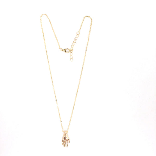 18” gold metal link style chain necklace with a detailed shiny gold hand pendant. Shown with chain